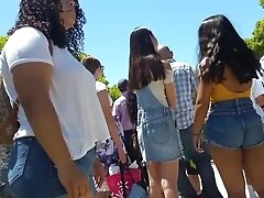 Tanned college girl with tiny shorts