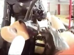 Horny dykes in latex enjoy kinky action