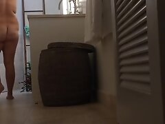 unaware milf in bathroom