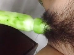 Girl use gherkin masturbation