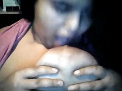 Arab slut sucks her tits