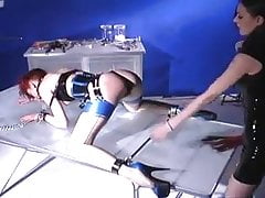 Mistress in latex and her girl slave
